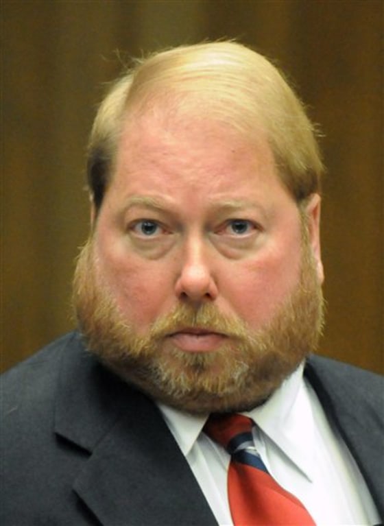 Former Pelham Mass., Police Chief Edward Fleury appears in Hampden Superior Court, in Springfield, Mass., on Monday. Fleury faces manslaughter charges in the 2008 accidental shooting death of 8-year-old Christopher Bizilj, of Ashford, Conn., who lost control of an Uzi submachine gun at a gun fair in Westfield, Mass.